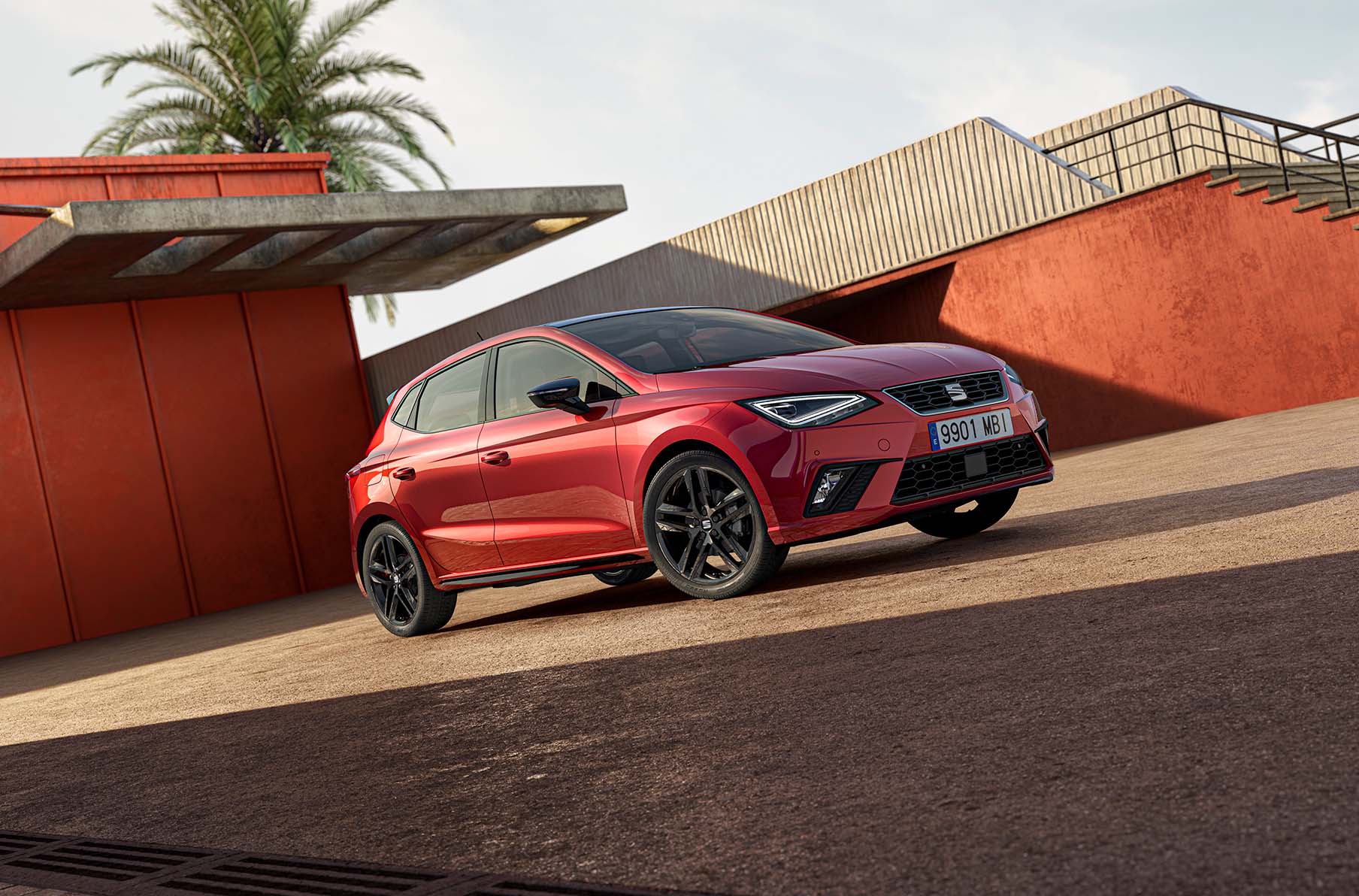 New seat ibiza fr car, black edition in fr trim, featuring a sleek black roof spoiler, a sporty supermini and glossy black accents.