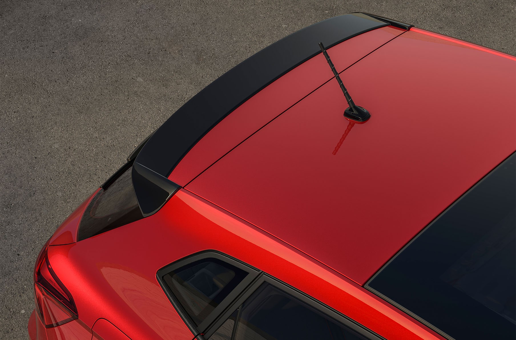 Close up of the seat ibiza fr vehicle, black edition rear window, featuring a sleek black roof spoiler that enhances the car's aerodynamics and sporty aesthetic.